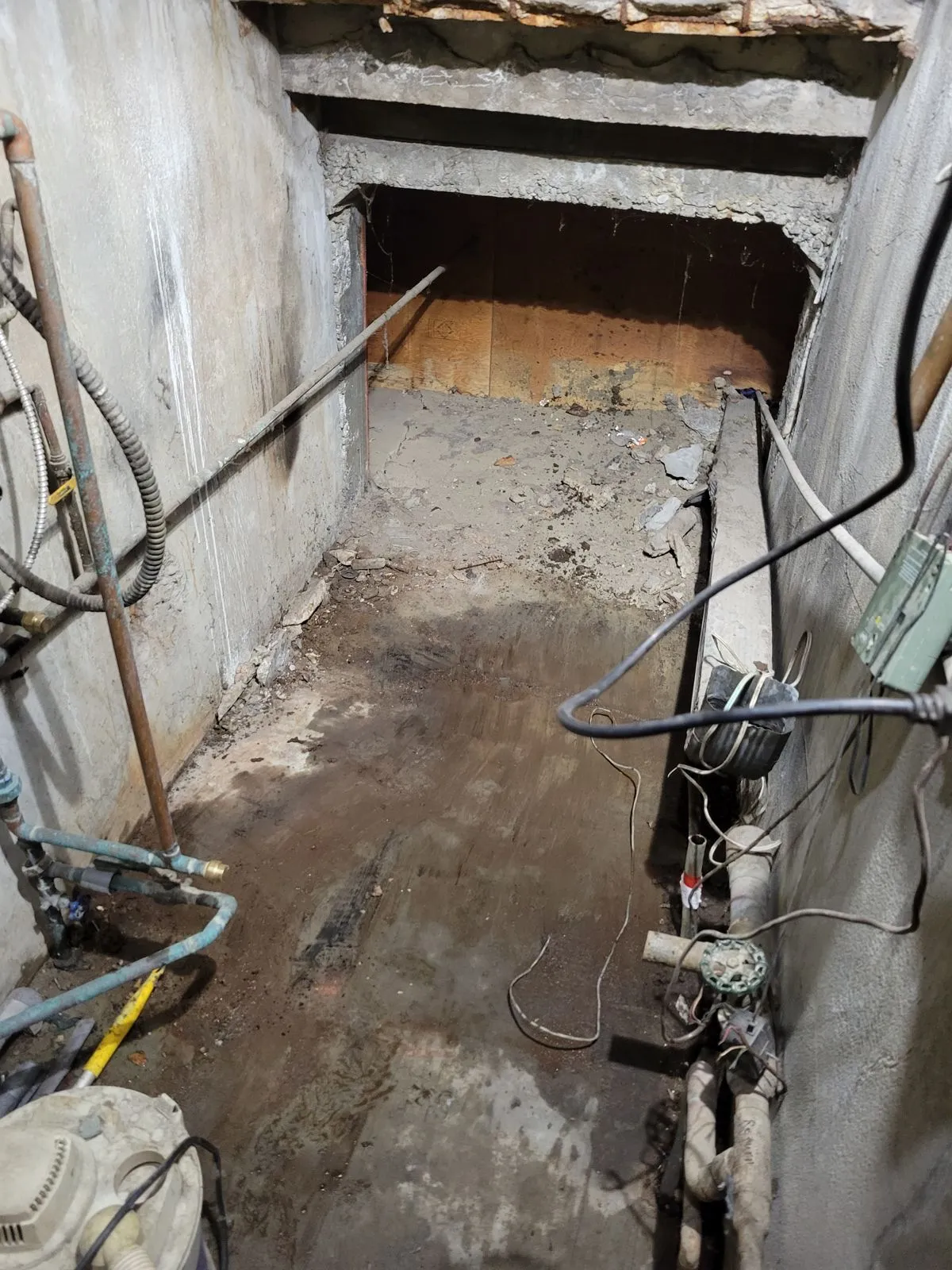 After: Cast iron boiler in a utility closet