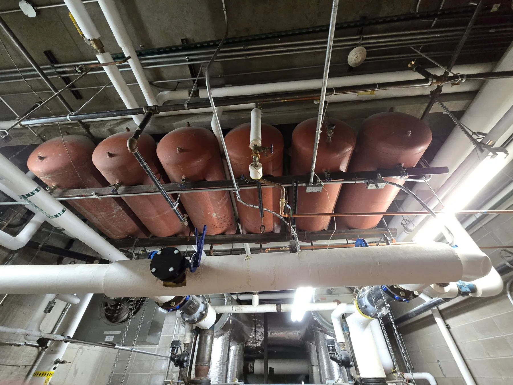 Before: Six expansion tanks overhead
