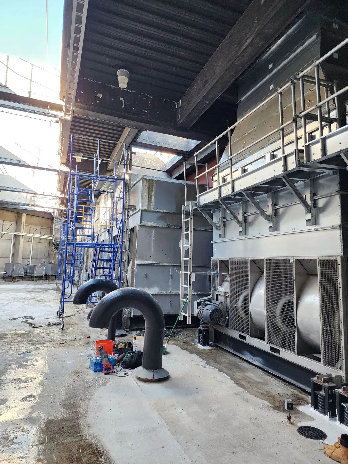 Commercial boiler plant with firetube boilers and piping before demolition