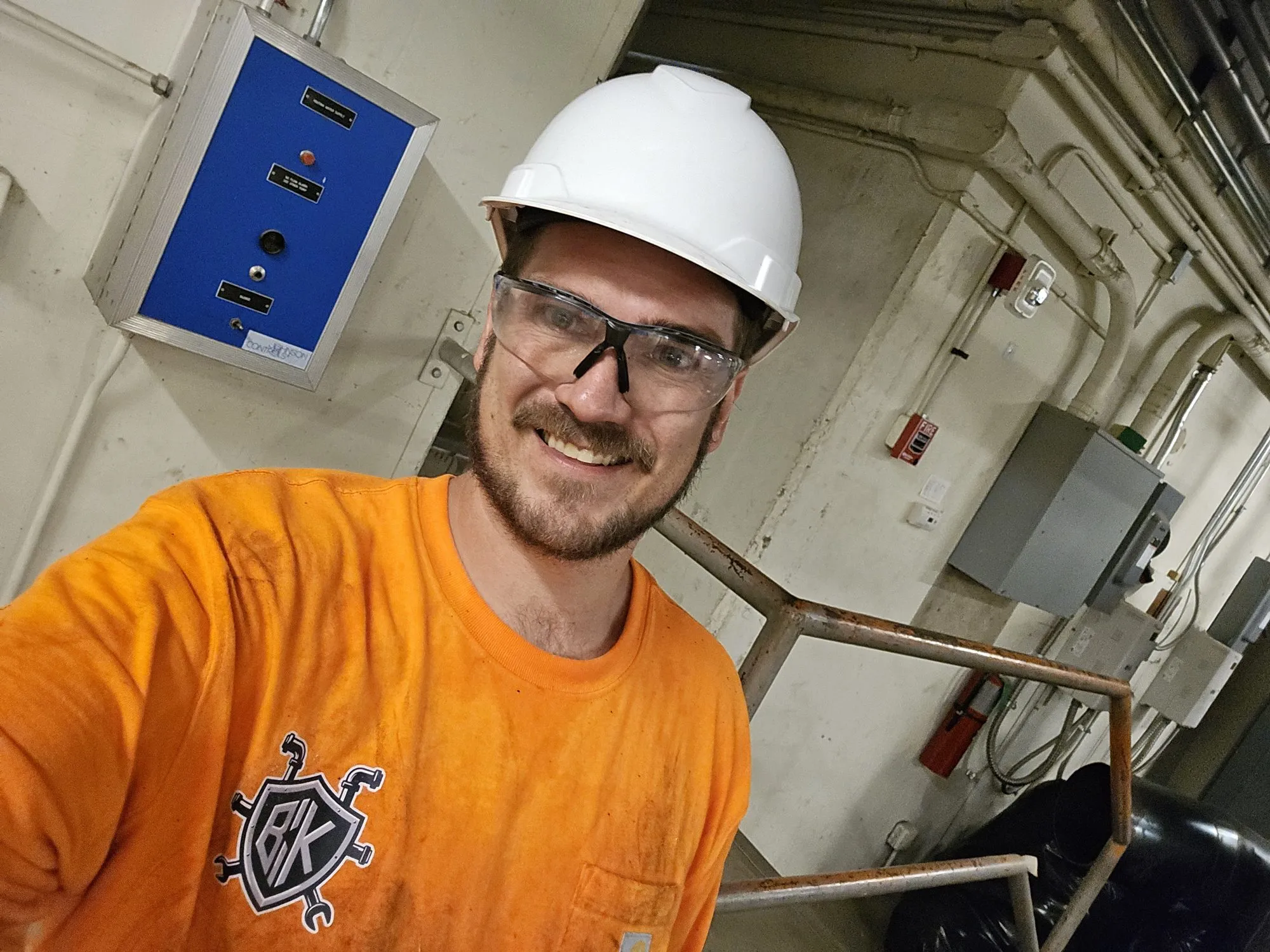 Saber Dean in PPE at a school boiler-room demolition